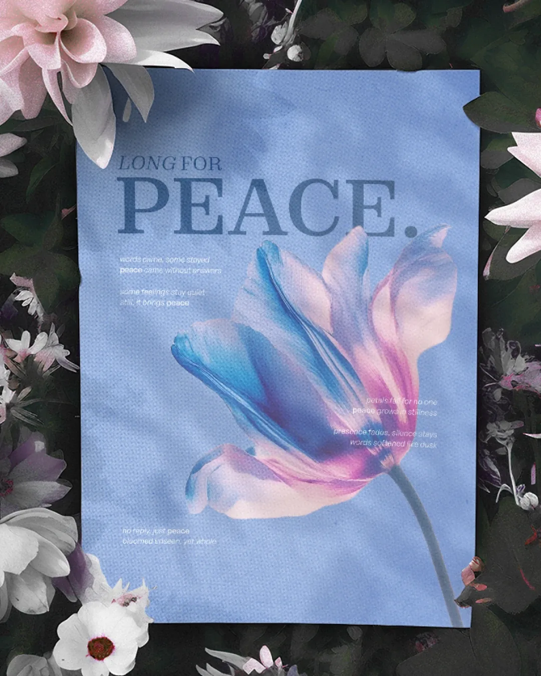 Long For Peace laid among real flowers.